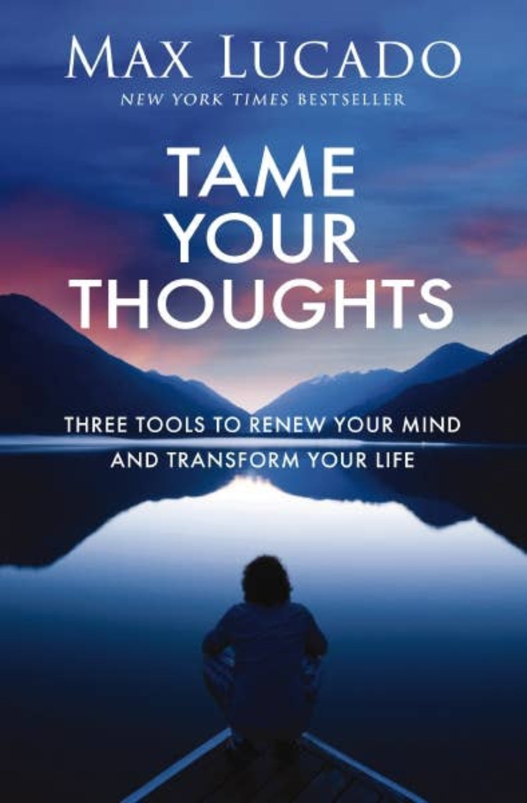 Book cover of 'Tame Your Thoughts' by Max Lucado with a person in a boat on a reflective lake.