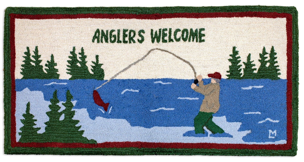 Decorative rug with a fishing scene and 'Anglers Welcome' text.