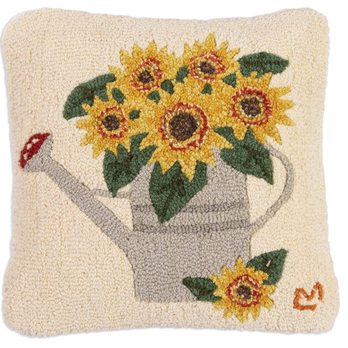 Decorative pillow with sunflowers and a watering can on a beige background
