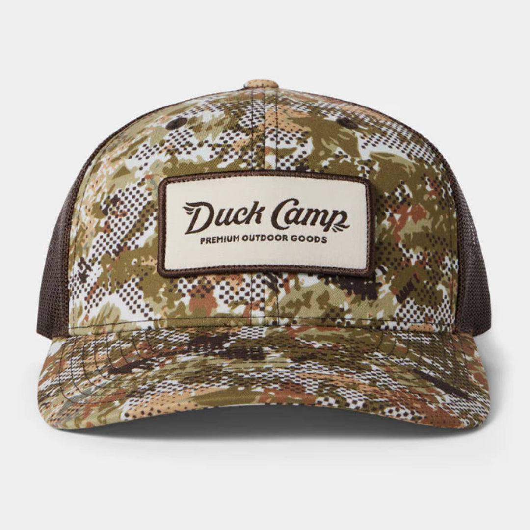 Camouflage cap with 'Duck Camp' logo on a white background