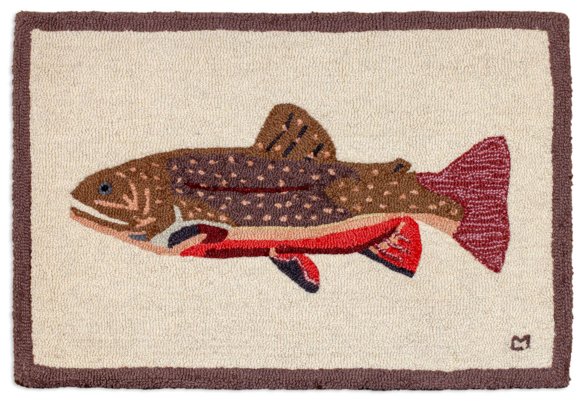 Rug with a fish design on a beige background