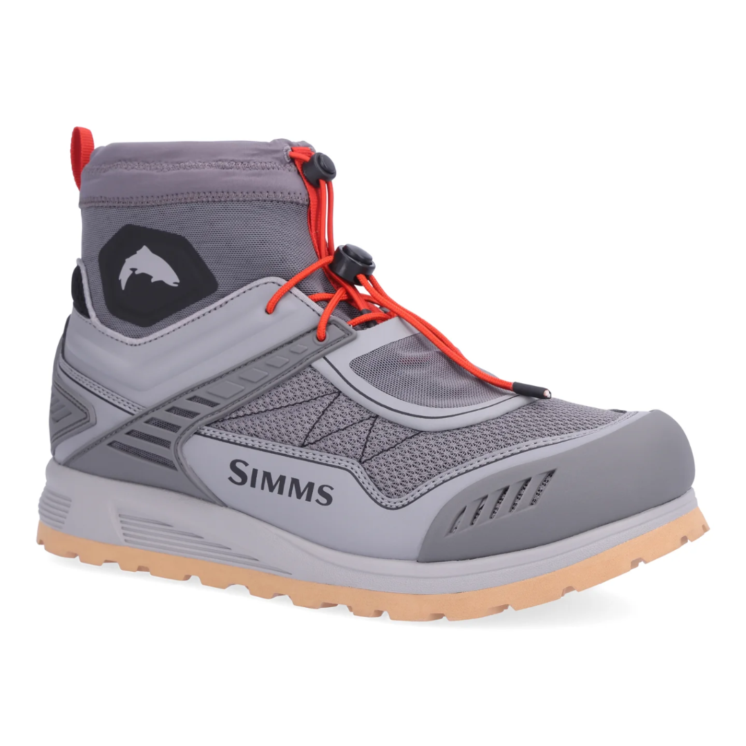 Gray hiking boot with red laces on a white background, featuring the Simms brand.