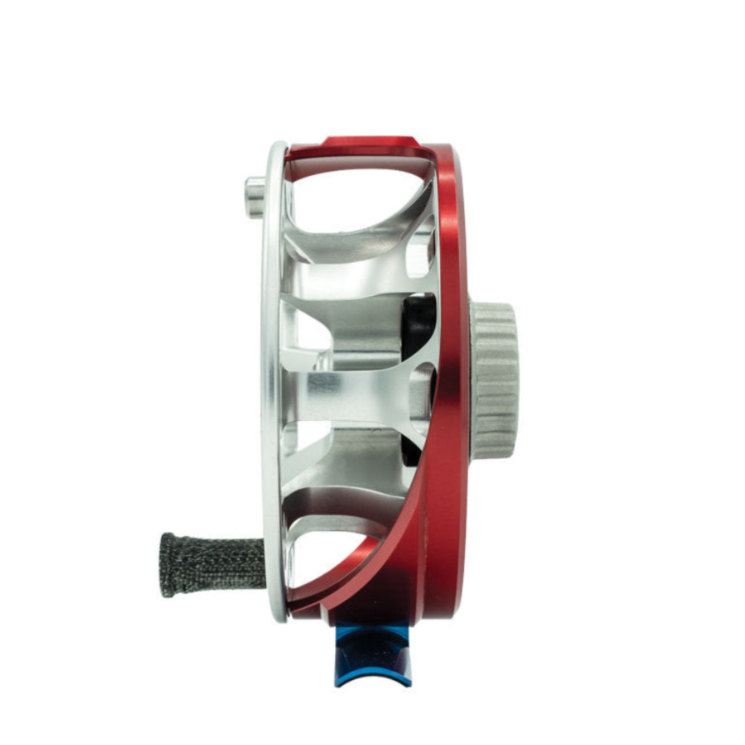 Fishing reel with red and silver design on a white background
