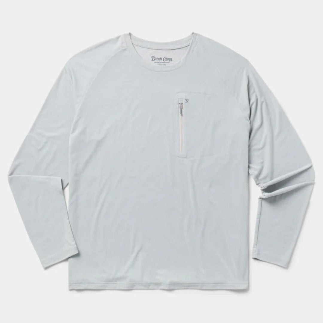 A light gray long-sleeve shirt with a vertical zippered chest pocket, laid flat against a light gray background.