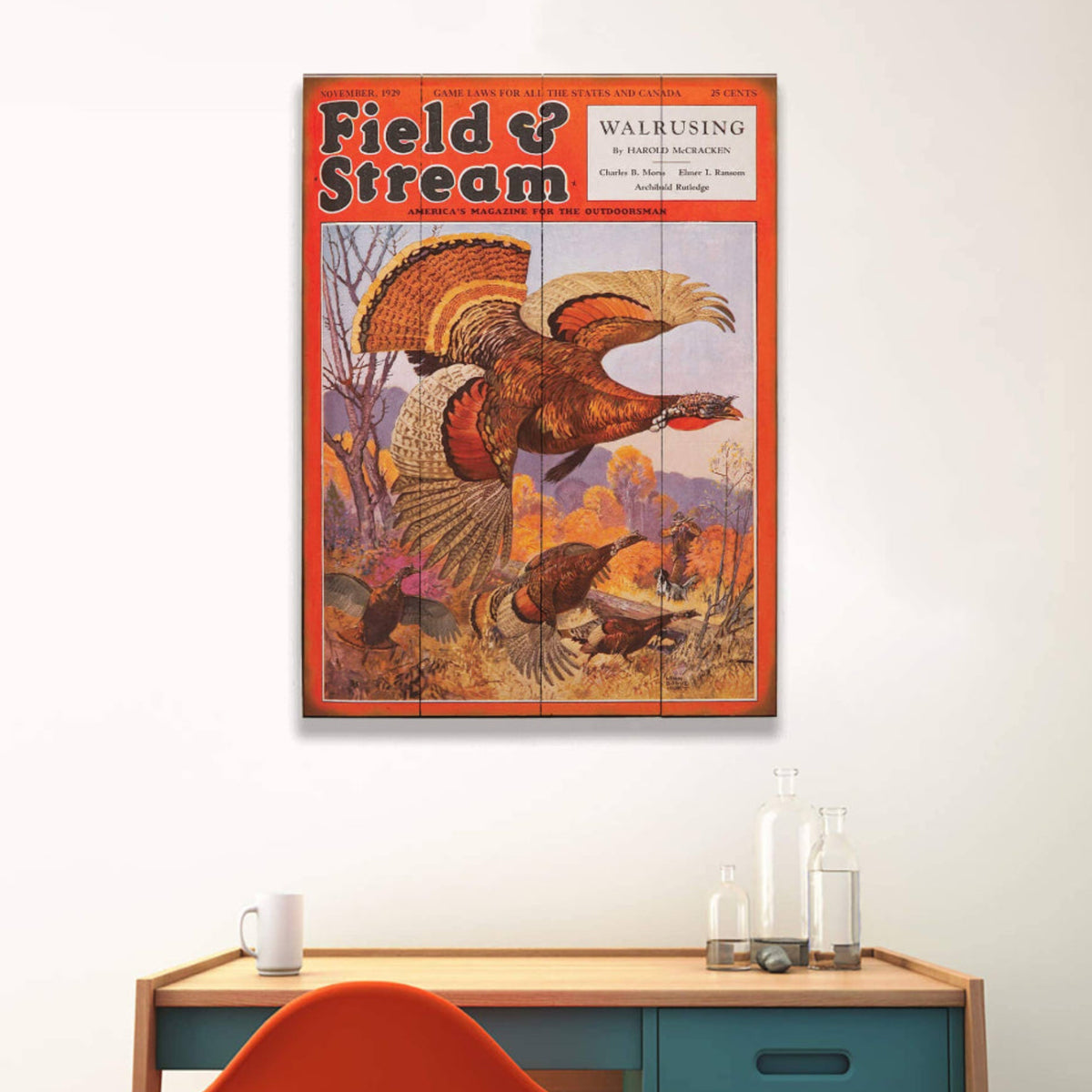 Vintage 'Field & Stream' magazine cover with a turkey on a wall above a desk.